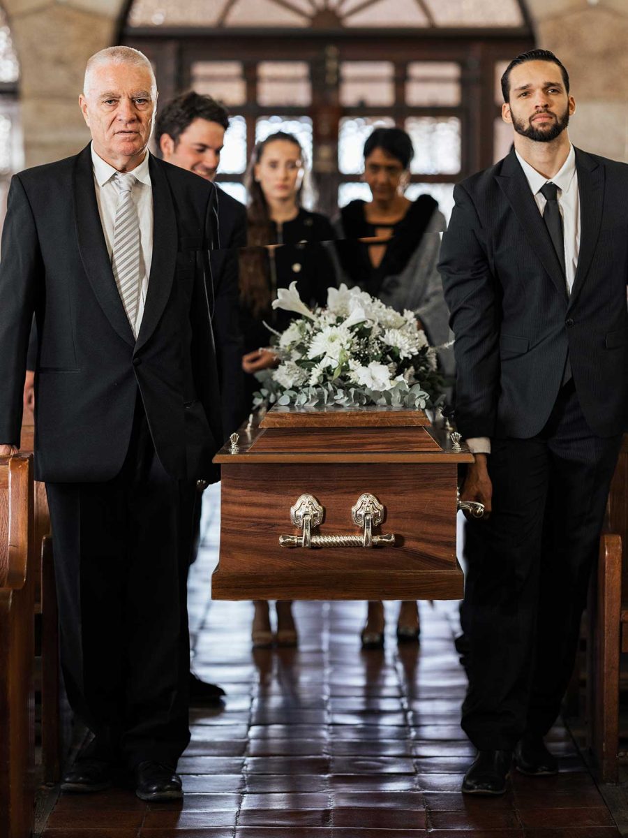 funeral-church-and-family-carry-coffin-for-death-2023-11-27-05-12-39-utc.jpg